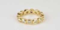 Diamond-alliance-ring-in18k-gold-with-fantasy-cut-diamonds