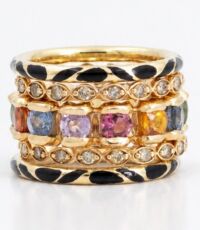 18k gold rings featuring a mix of sapphires, diamonds, and black enamel